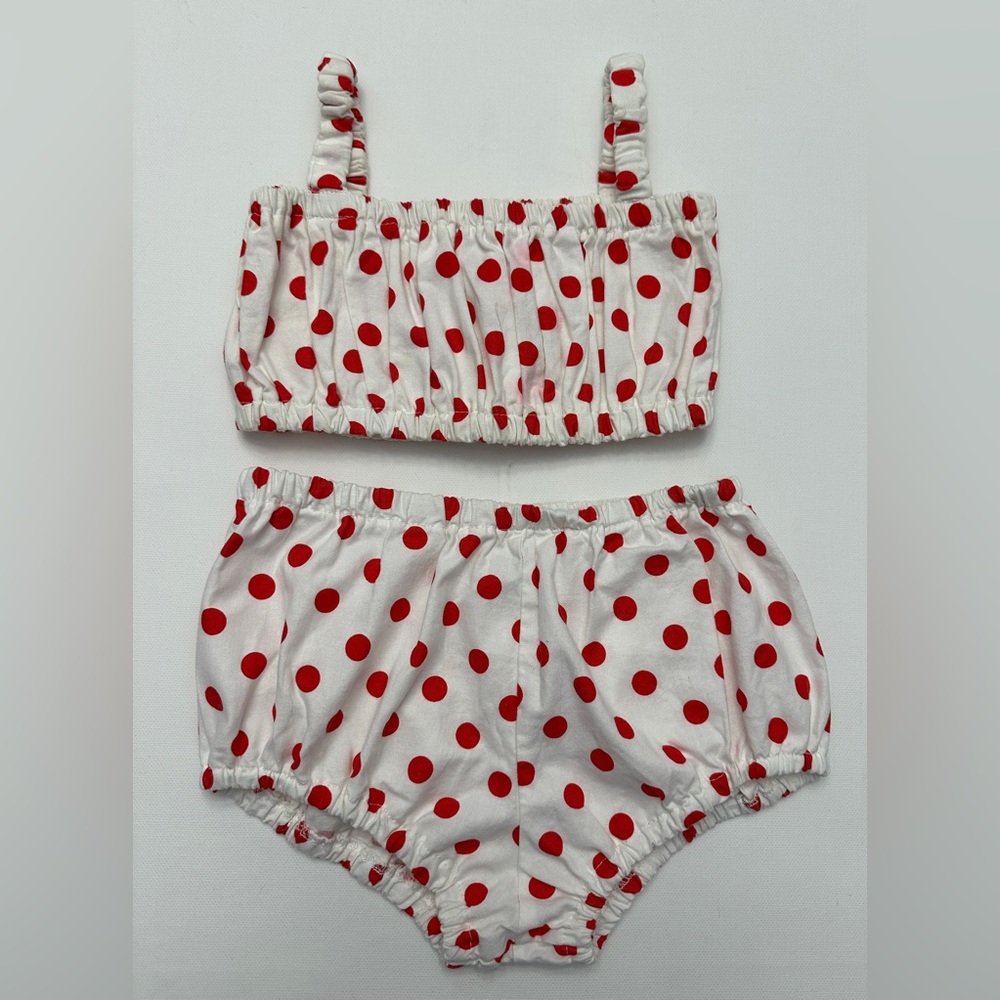 Paush girl’s white two-piece outfit with red polka dots.  Size 18M.